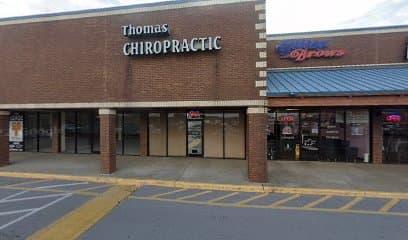 Dr. Mark Thomas - Photo 1