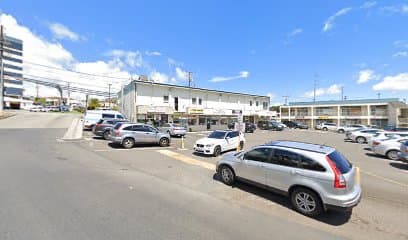 Dr Raymond K Yoza - Photo 1